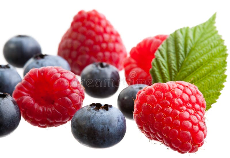 Group of raspberries and blueberries isolated on white background. Group of raspberries and blueberries isolated on white background