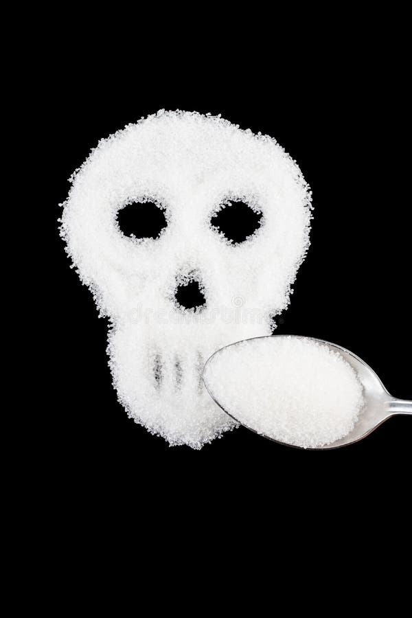 The skull made from sugar. Sugar Kills.Black background. diabetes concept. Suggesting dieting concept. Unhealthy white sugar concept. Copy space. Space for text. The skull made from sugar. Sugar Kills.Black background. diabetes concept. Suggesting dieting concept. Unhealthy white sugar concept. Copy space. Space for text.
