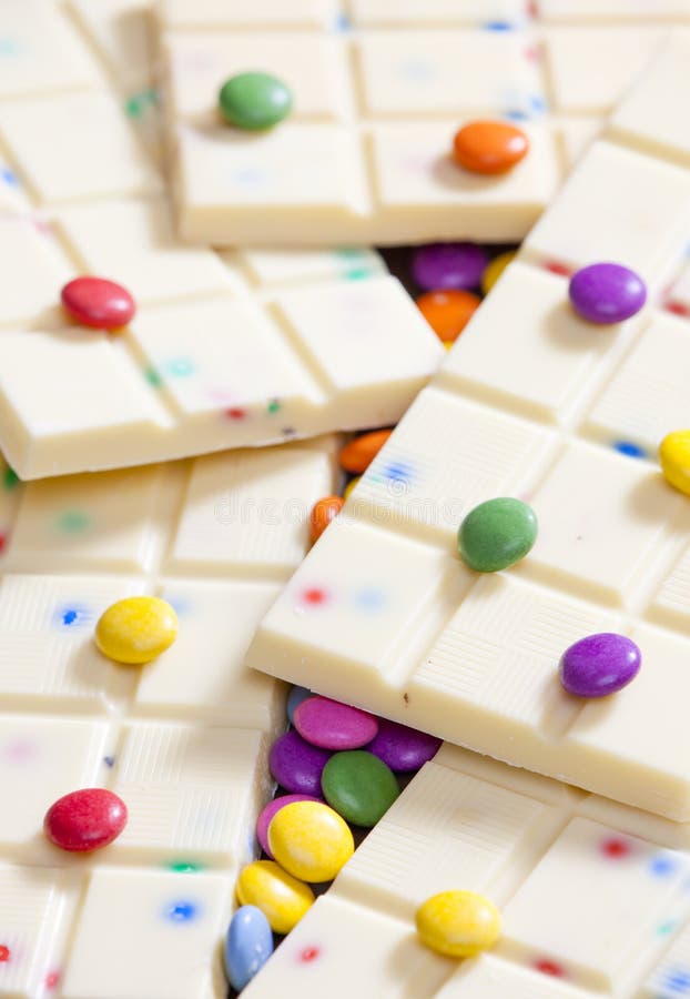 Still life of white chocolate with smarties. Still life of white chocolate with smarties