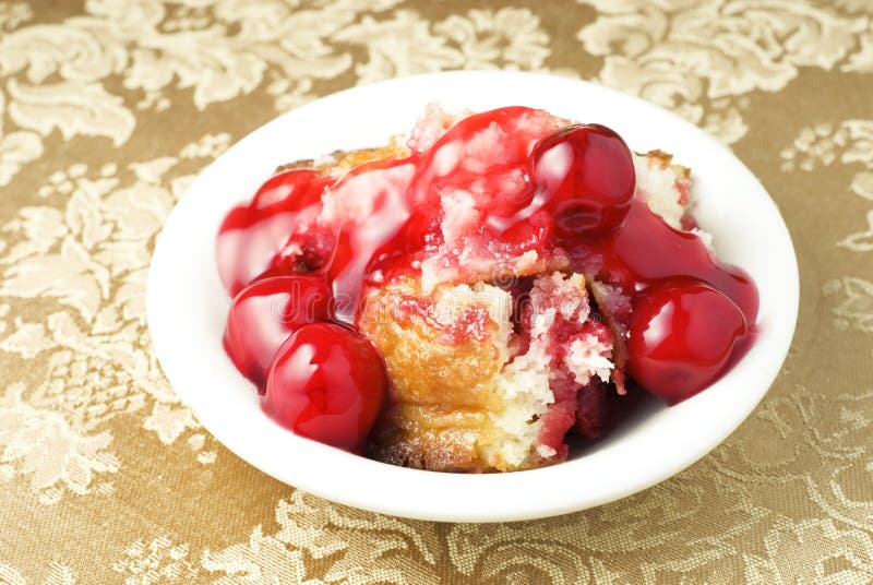 Elegant bowl of warm Cherry Cobbler with copy space. Elegant bowl of warm Cherry Cobbler with copy space