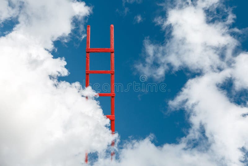 A red wooden staircase against a blue cloud of a symbol of success and achievement of set goals. A red wooden staircase against a blue cloud of a symbol of success and achievement of set goals