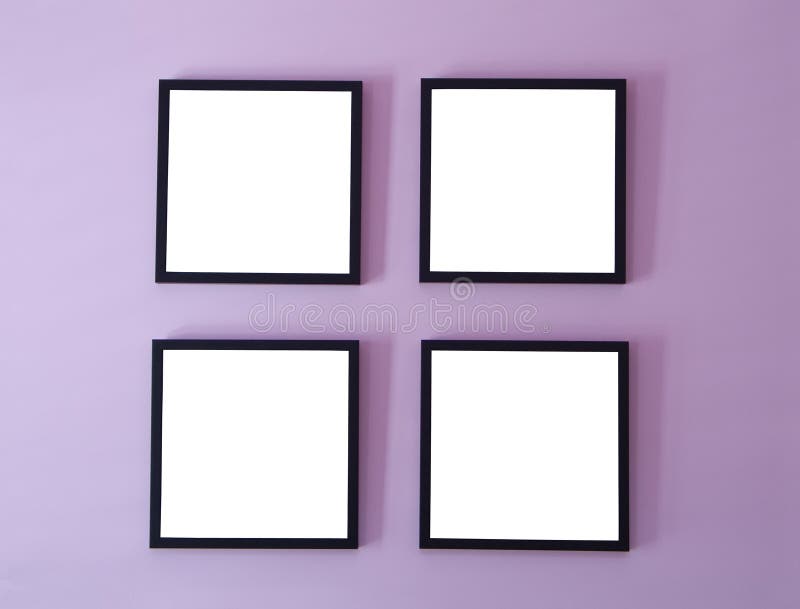 Four blank picture/photo frames on wall. Four blank picture/photo frames on wall