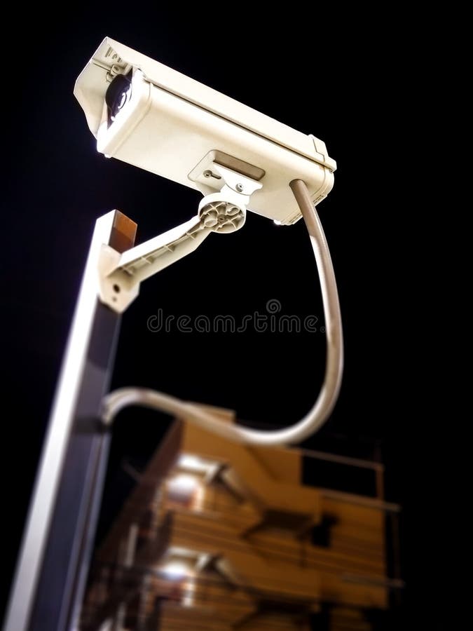 Cámara de seguridad comercial por la tarde imágenes de archivo libres de regalías Cámara de seguridad comercial por la tarde imágenes de archivo libres de regalías