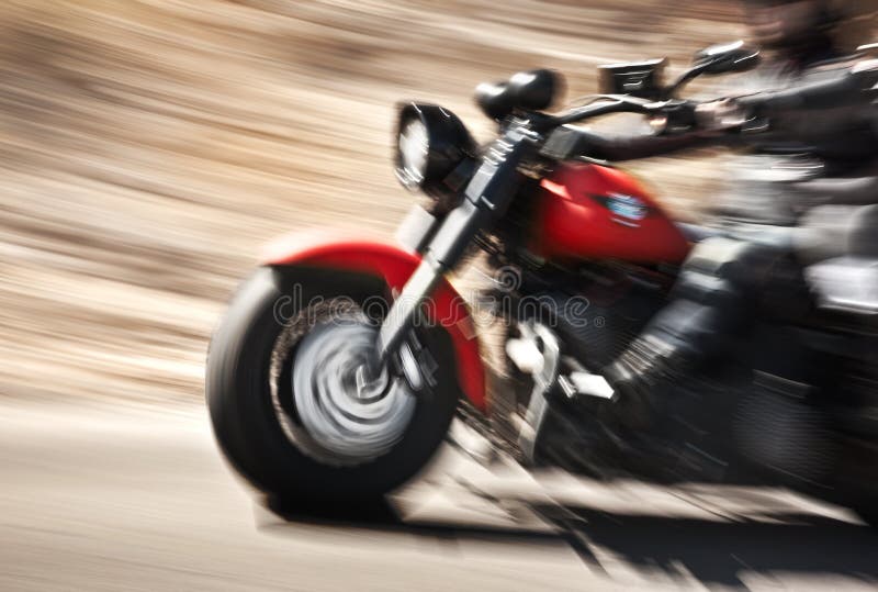 Cámara lenta abstracta, moto del montar a caballo del motorista imagen de archivo libre de regalías