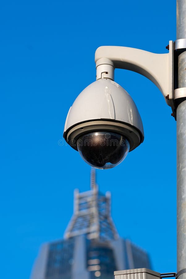 Surveillance Cameras of Office Building Under Blue Sky. Surveillance Cameras of Office Building Under Blue Sky