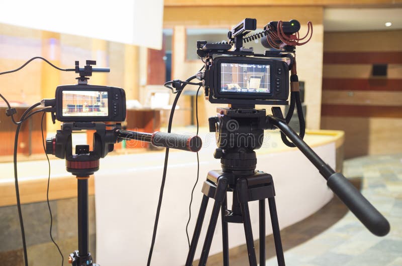 Cameras taking live video streaming at event. Technology live streaming and broadcast concept. Selective focus. Cameras taking live video streaming at event. Technology live streaming and broadcast concept. Selective focus