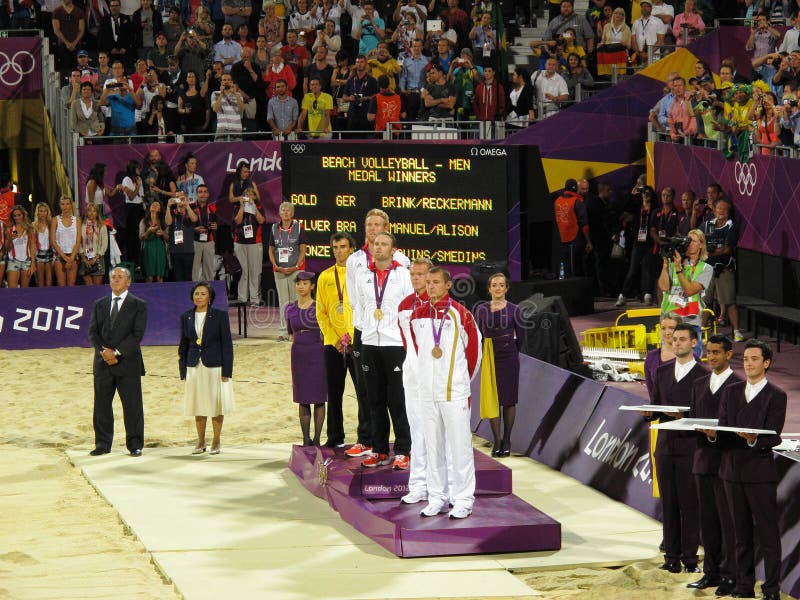 Award Ceremony after men's beach volleyball finals. Horse Guards Parade stadium, Olympic Games, London 2012. Ranking: 1. Julis Brink / Jonas Reckermann, GER, 2. Alison Cerutti, BRA / Emanuel Rego, 3. Martins Plavins / Janis Smedins, LVA. Award Ceremony after men's beach volleyball finals. Horse Guards Parade stadium, Olympic Games, London 2012. Ranking: 1. Julis Brink / Jonas Reckermann, GER, 2. Alison Cerutti, BRA / Emanuel Rego, 3. Martins Plavins / Janis Smedins, LVA