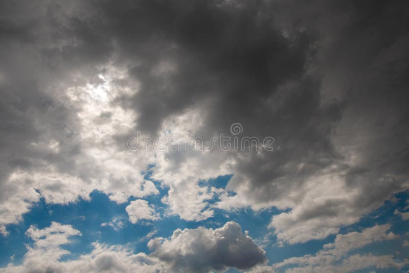 Cloudy beautiful sky with a glimpse of the sun. Cloudy beautiful sky with a glimpse of the sun