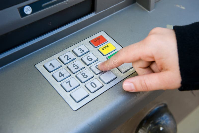 Código do Pin na máquina do ATM imagens de stock Código do Pin na máquina do ATM imagens de stock