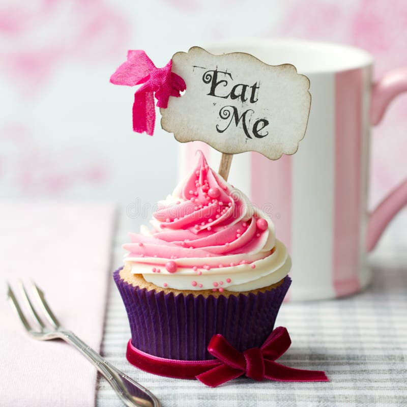 Cupcake with Eat Me pick. Cupcake with Eat Me pick