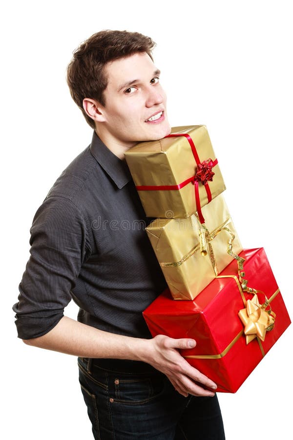 Día De Fiesta. Hombre Joven Que Da Las Cajas De Regalos De Los Presentes  Imagen de archivo - Imagen de conseguido, acontecimiento: 39506913