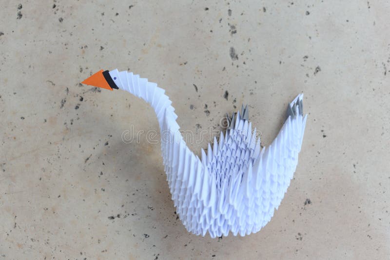 3D modular origami paper swan handmade with white paper â€“ an example of craftwork and handwork requiring craftsmanship