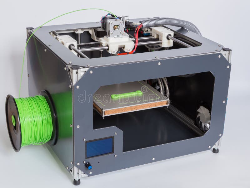 3d printer with bright green filament. stock photography 3d printer with bright green filament. stock photography