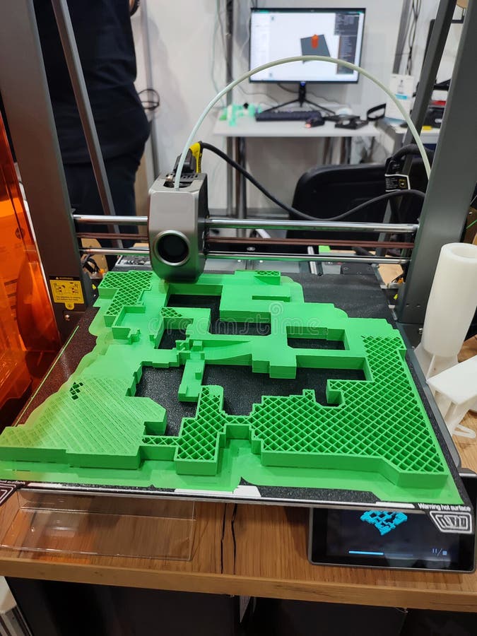 3D printer printing object close-up. Process creating three-dimensional model royalty free stock photography