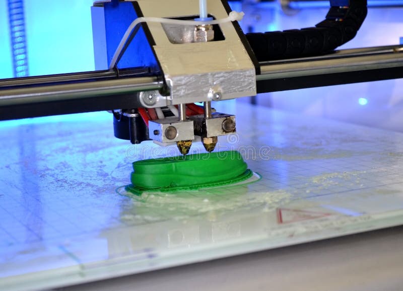 3D Printer Prints the Form of Molten Plastic Green. Stock Image - D Printer Prints Form Molten Plastic Green Close Up Automatic Three Dimensional Performs MoDeling Laboratory Progressive 145459063
