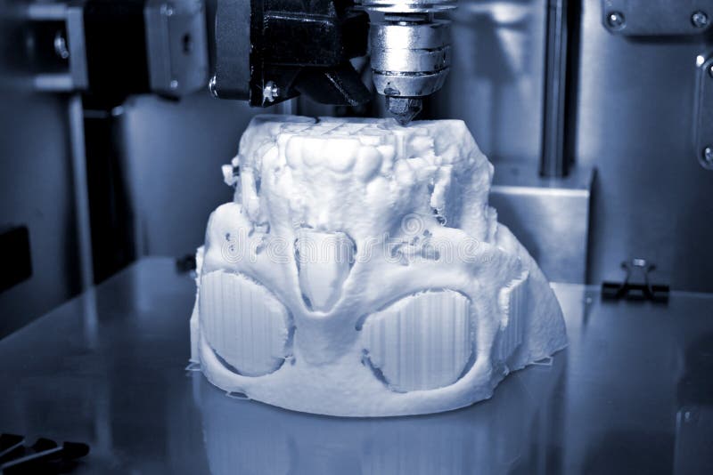 3D printer prints the form of molten plastic white. stock photos