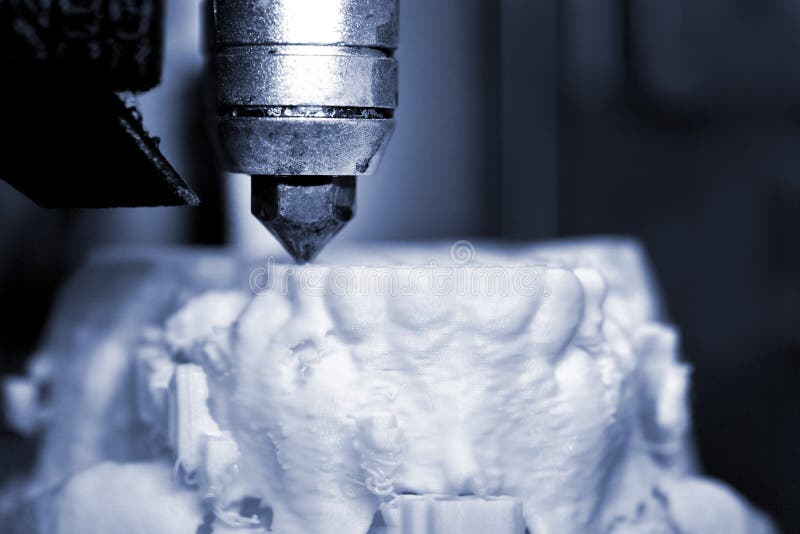 3D printer prints the form of molten plastic white. royalty free stock photo
