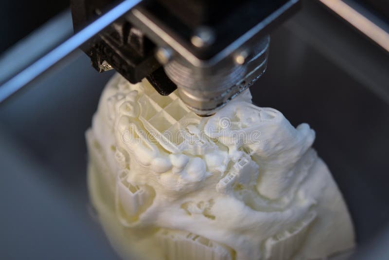 3D Printer Prints the Form of Molten Plastic White. Stock Photo Image