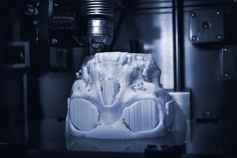3D printer prints the form of molten plastic white. stock photo