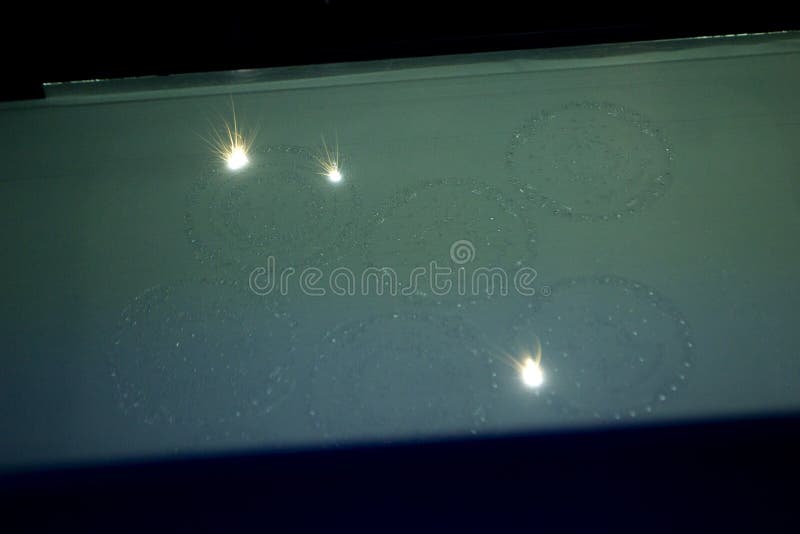 3D printer prints object from metal powder. stock image
