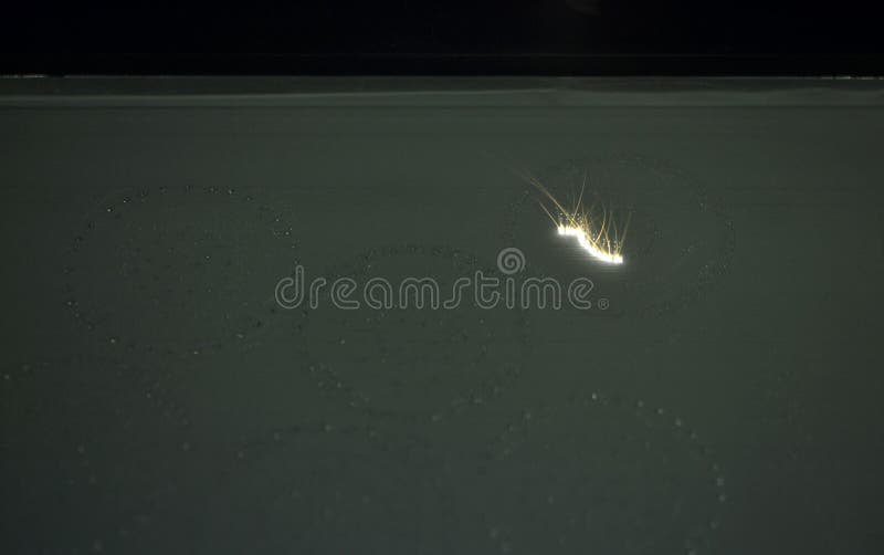 3D printer prints object from metal powder stock image