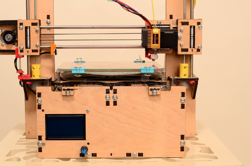 3D printer prints red form royalty free stock photos