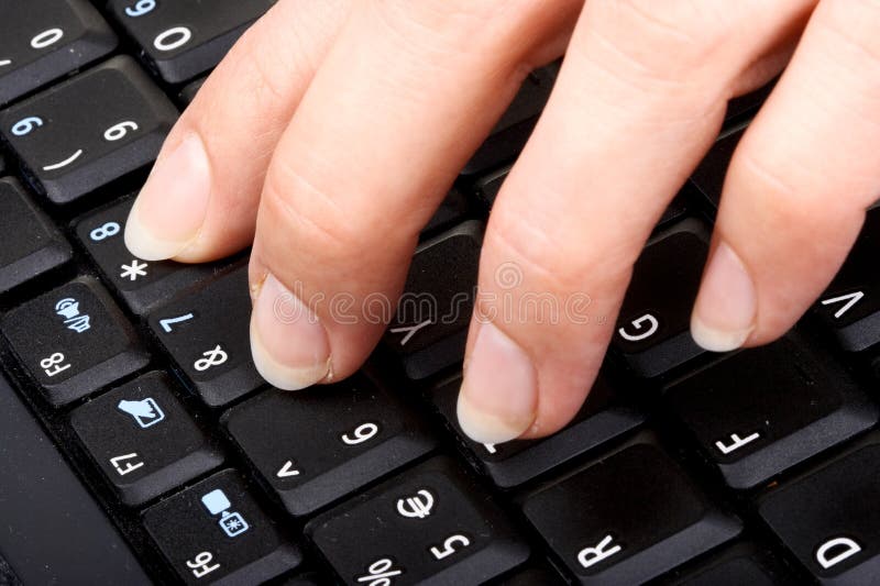 Female fingers on the keyboard. Female fingers on the keyboard