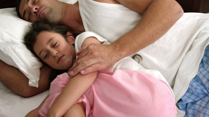 Dad and daughter sleeping stock footage. Video of hair - 70842424