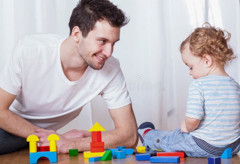 Dad having fun with son stock photo Dad having fun with son stock photo