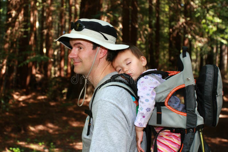 Dad hiking with baby girl