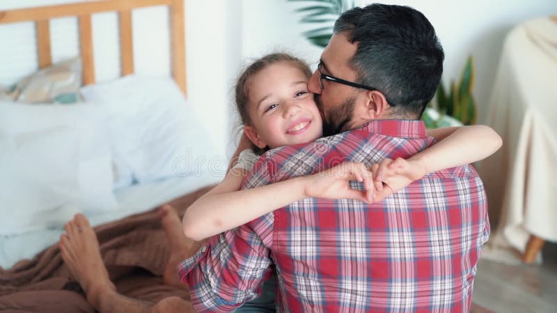 Dad Hugs and Kisses His Daughter, Girl Shows Heart with Hands, Slow Motion Stock Footage - Video of togetherness, smile: 150142888