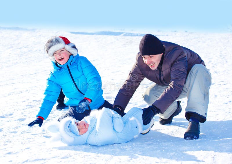 Dad and kids in snow stock images Dad and kids in snow stock images