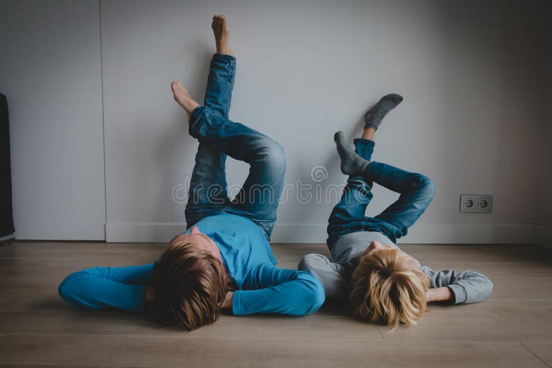 Dad and son relax at home, comfort and family time royalty free stock images Dad and son relax at home, comfort and family time royalty free stock images
