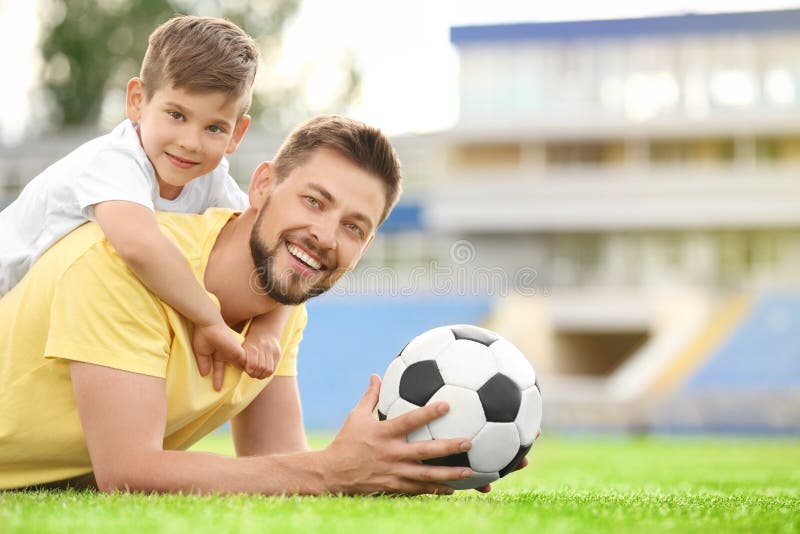 Dad and son with soccer ball. royalty free stock photography Dad and son with soccer ball. royalty free stock photography