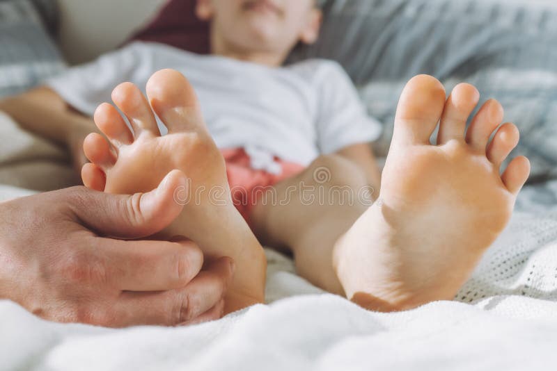 Boy feet tickle