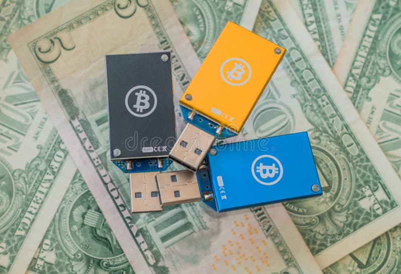 Bitcoin USB Miners On Top Of American Money Stock Photo - Image of miner, dollar: 112150500