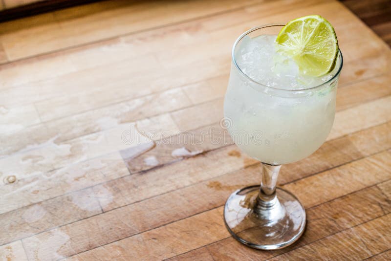 Daiquiri Cocktail with Lime and Crushed Ice. Stock Photo Image of