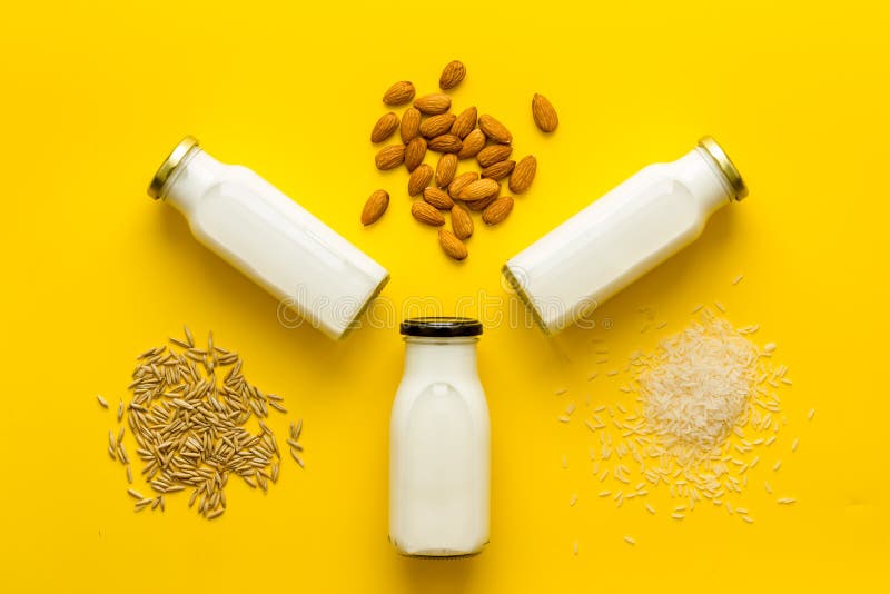 Dairy Free Substitute Milk with Nuts and Cereals, Top View Stock Photo