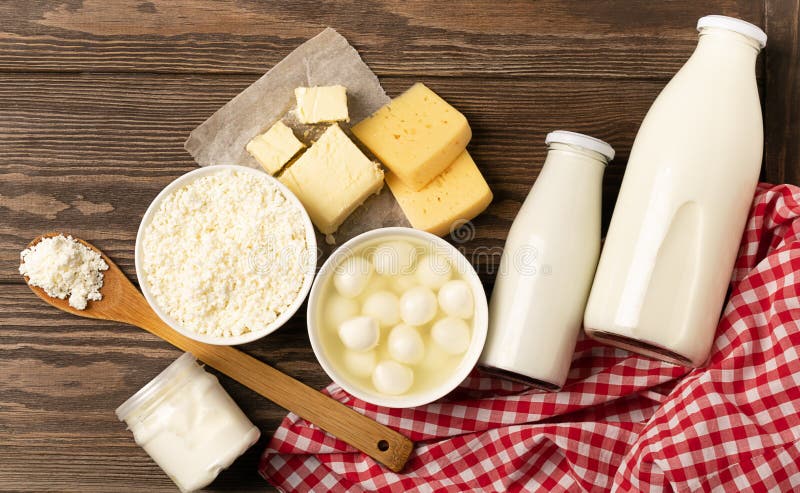 Dairy Sour Milk Products on a Wooden Dark Rustic Background. Milk ...