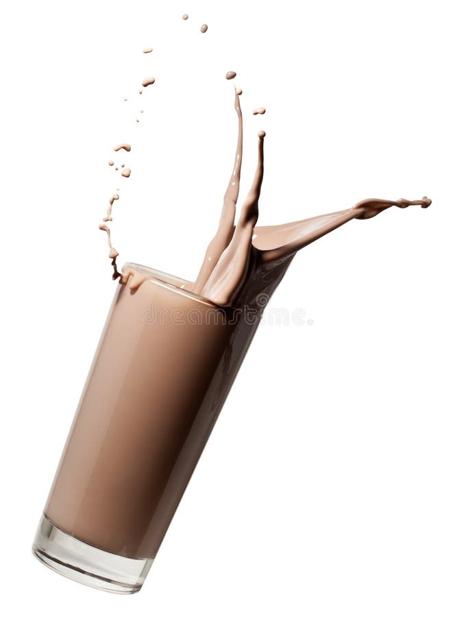 Vallend glas chocolademelk stock afbeelding