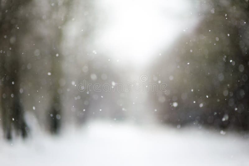 Dalende sneeuw, vage Kerstmistextuur royalty-vrije stock fotografie Dalende sneeuw, vage Kerstmistextuur royalty-vrije stock fotografie