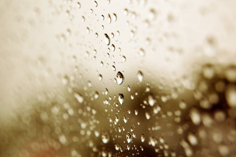 Drops of rain water sticked on the glass. Drops of rain water sticked on the glass