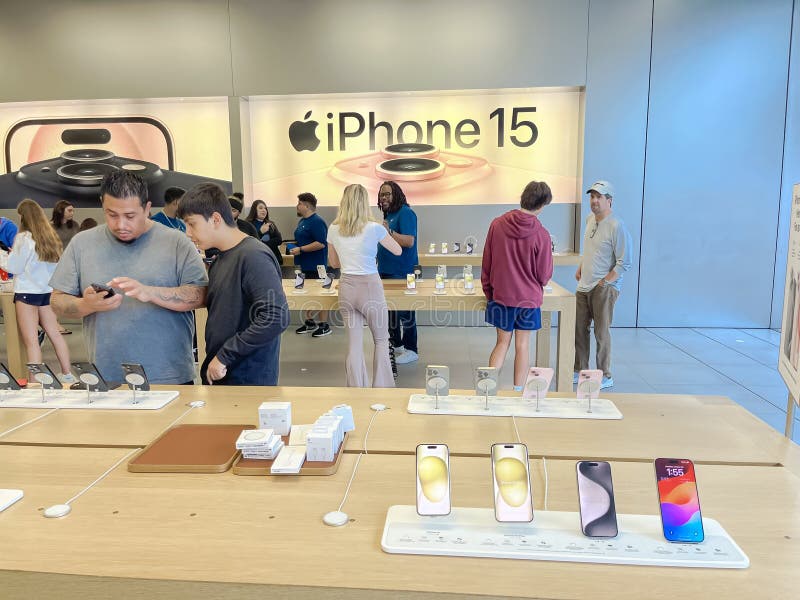 Orlando, FL USA - November 20, 2020: Salespeople and customers at an Apple  store looking at the latest Apple products for sale Stock Photo - Alamy