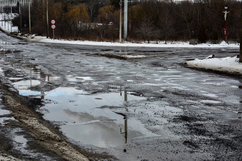 Damaged Asphalt Road after Winter Stock Image - Image of deep, country ...