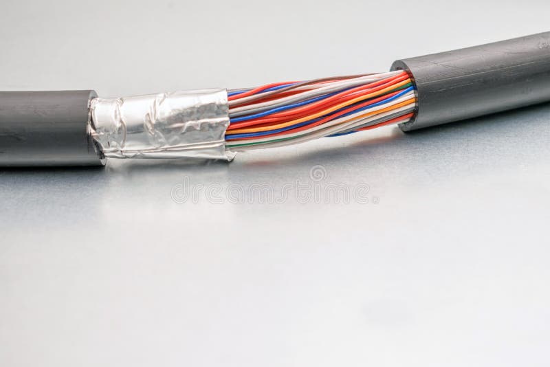Damaged Isolation of Backbone channel. Multicolored trunk cable is torn off. Damaged multicore communication line. High speed data transfer. Damaged extension cord stock images, royalty-free photos and pictures