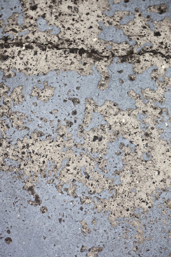 Damaged & Painted Concrete Etched into Rough Surface Stock Photo