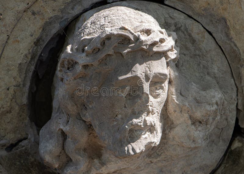 Damaged Statue of Jesus Christ on a Tombstone Stock Image Image of