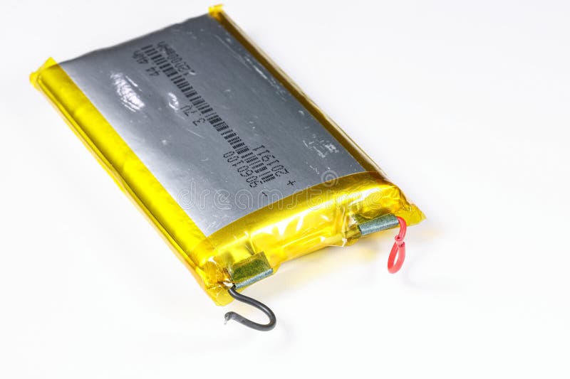 Damaged swollen Lithium polymer, Li-ion batteries for mobile device. stock photo