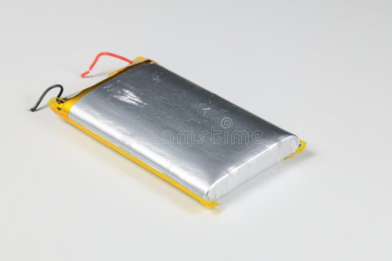 Damaged swollen Lithium polymer, Li-ion batteries for mobile device. royalty free stock photos
