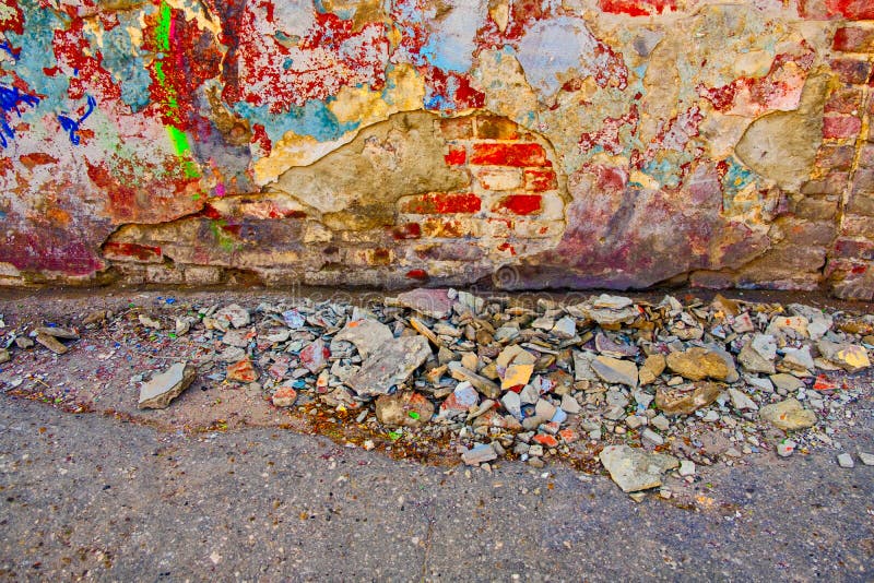 Damaged Wall with Building Garbage Beneath Stock Photo - Image of close ...
